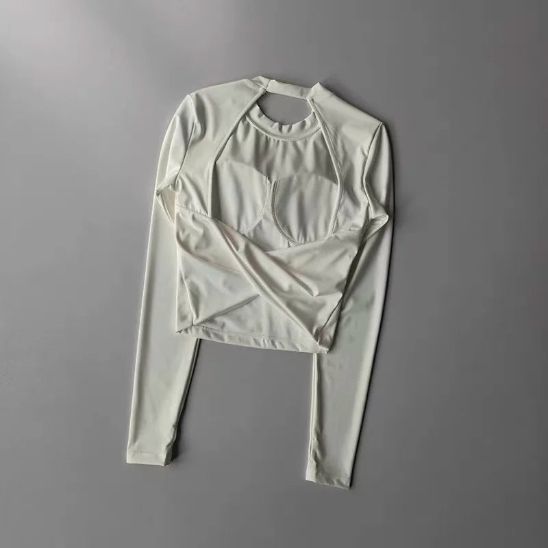 Top Sportivo Corto a Maniche Lunghe con Schiena Scoperta