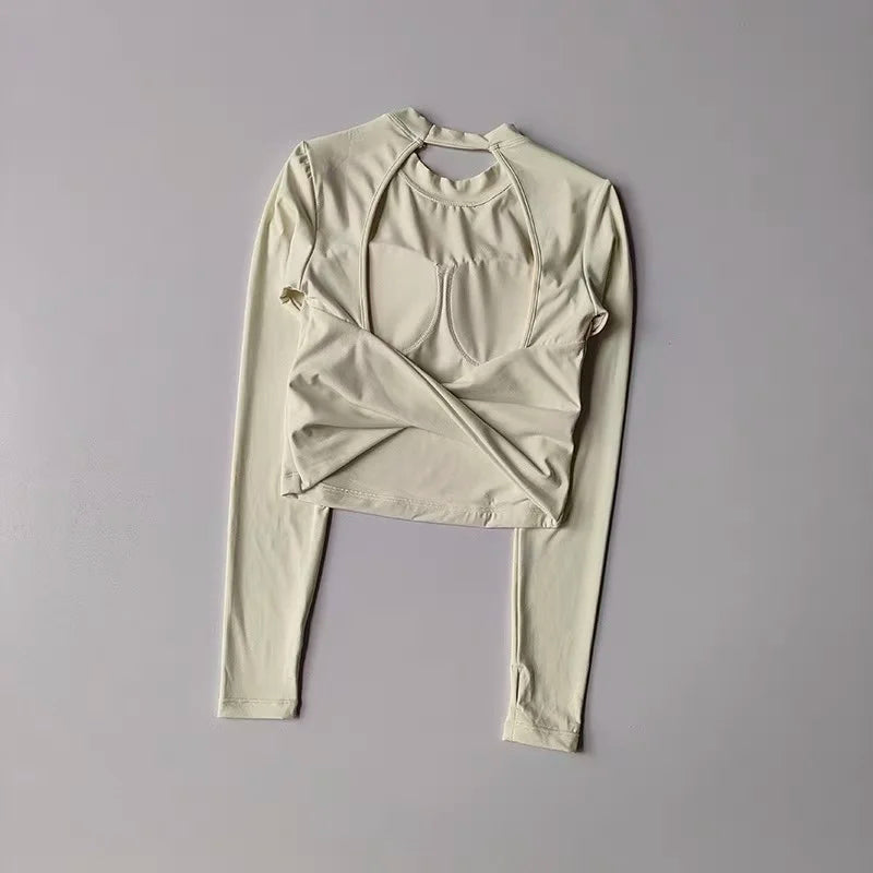 Top Sportivo Corto a Maniche Lunghe con Schiena Scoperta