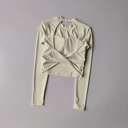 Top Sportivo Corto a Maniche Lunghe con Schiena Scoperta