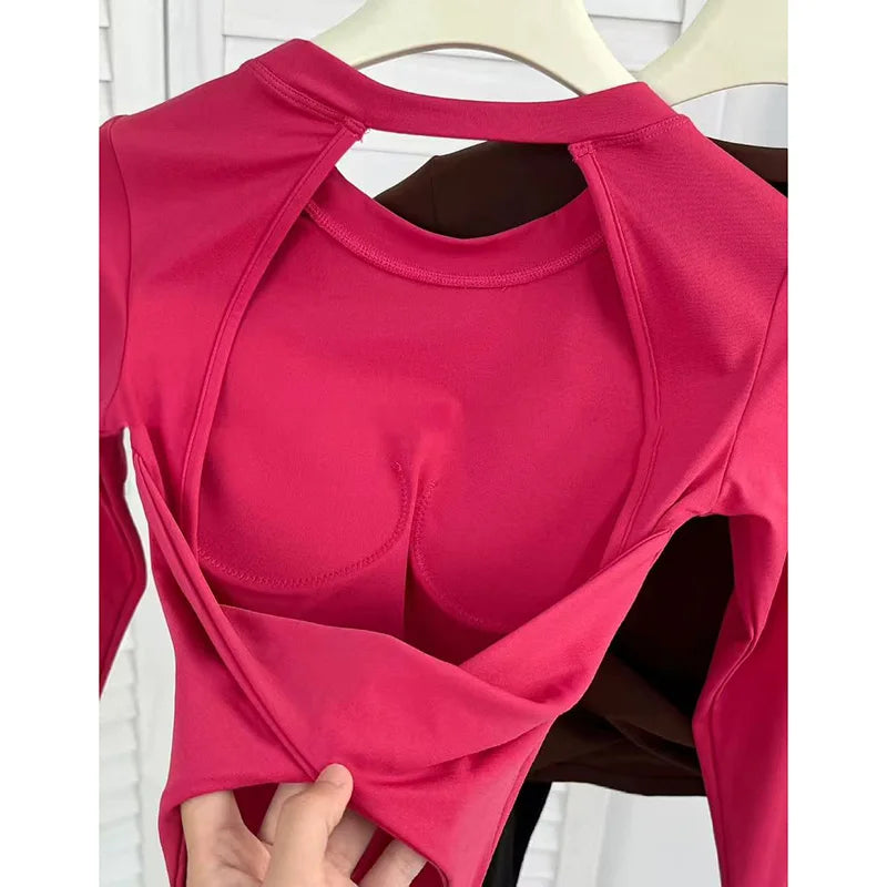 Top Sportivo Corto a Maniche Lunghe con Schiena Scoperta